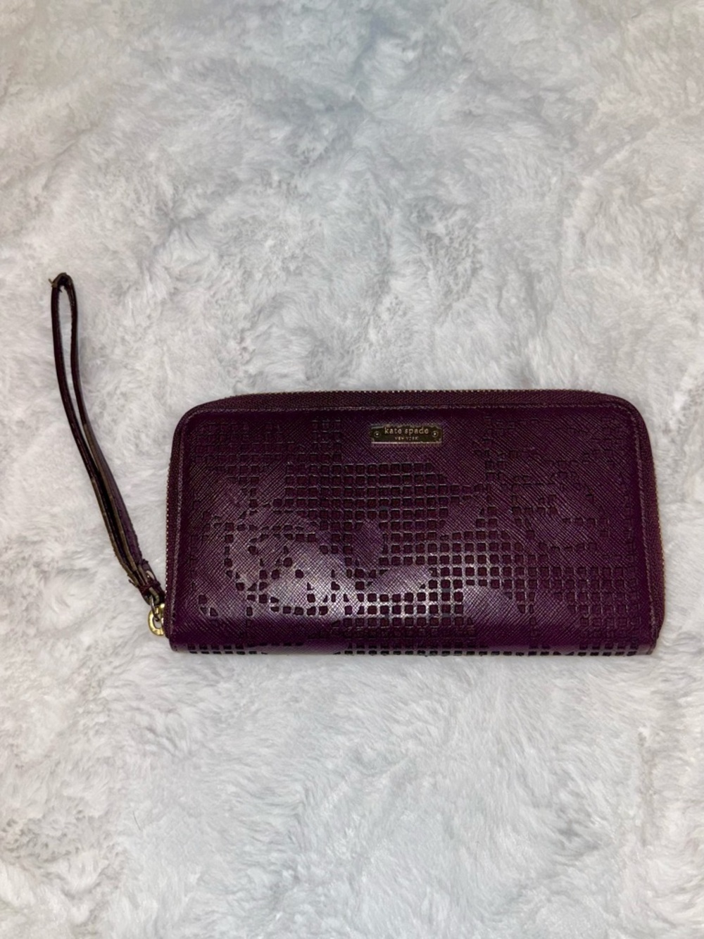 kate spade Plum Perforated Zip-Around Wristlet Wallet